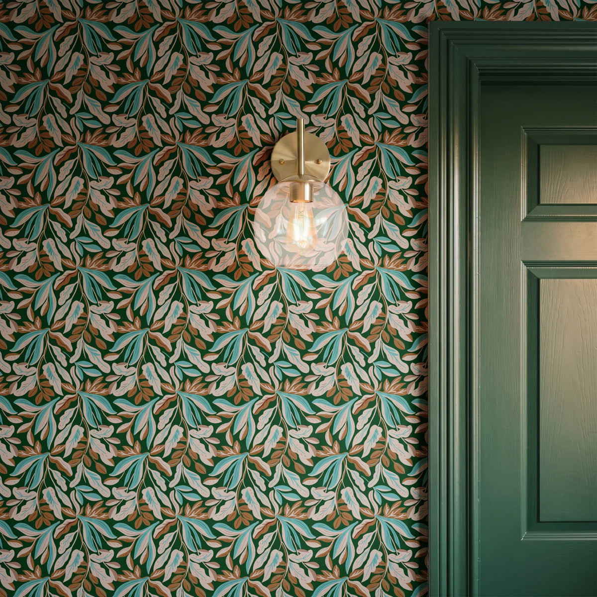 Tropical leaves pattern in green, turquoise, beige, and brown on dark green background