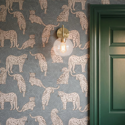 Leopards in various poses on gray background with leaf pattern