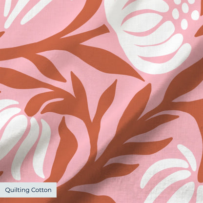 Pink and coral floral pattern with stylized flowers and leaves in a repeating design