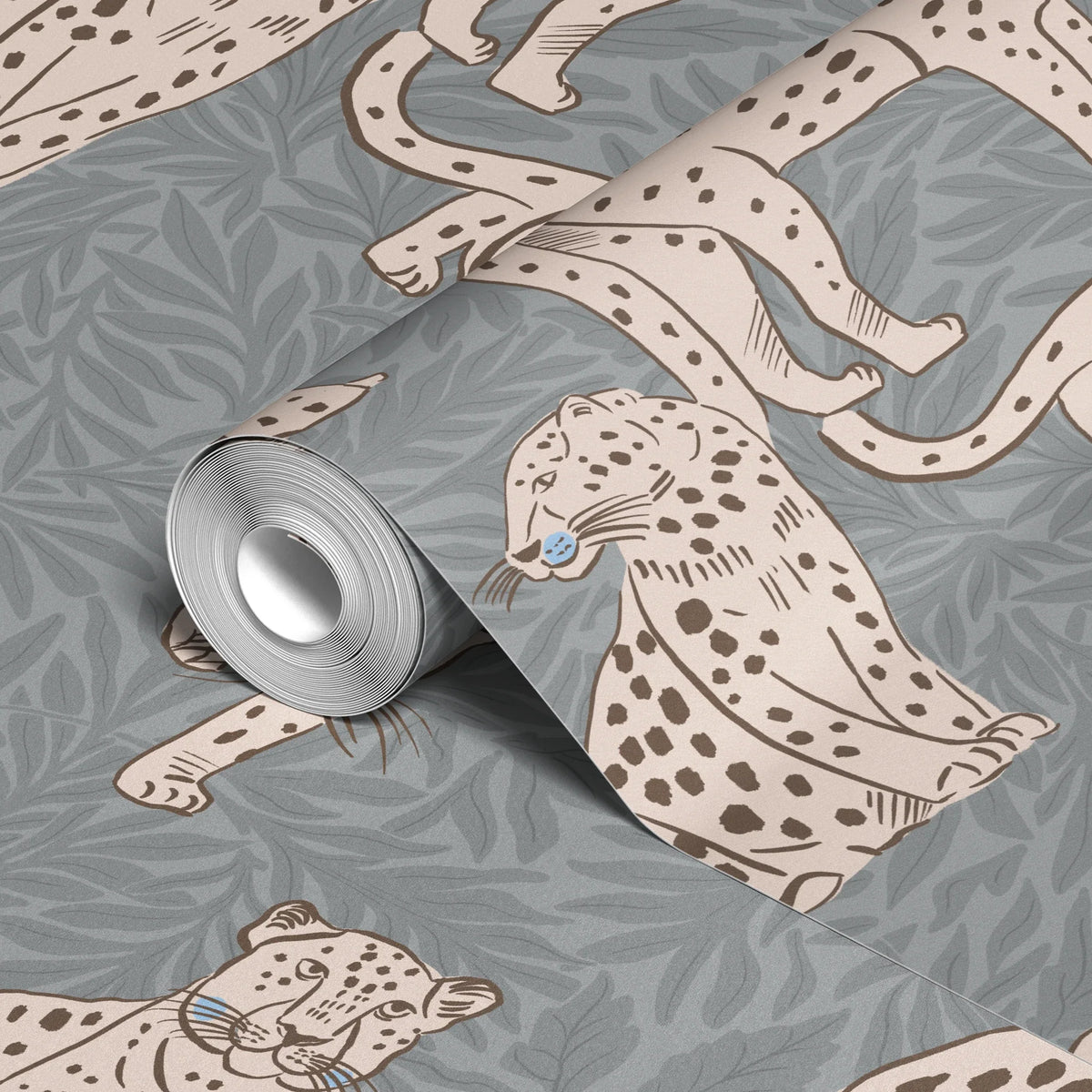 Leopards in various poses on gray background with leaf pattern