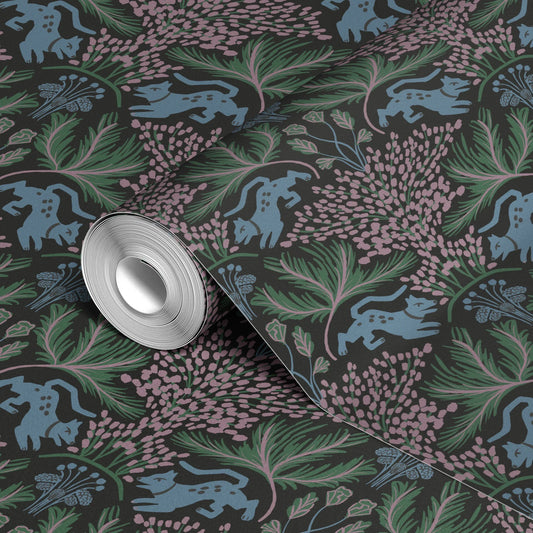 Symmetrical Art Nouveau pattern with blue rabbits, pink flowers, and green foliage on dark backgroun